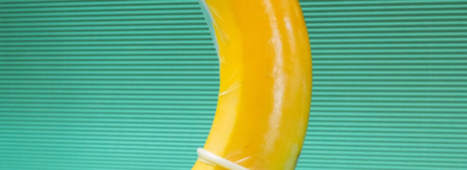 yellow banana fruit on green textile